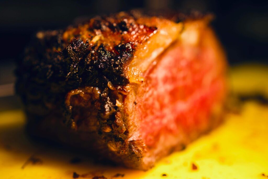 Roast sirloin of beef on a chopping board